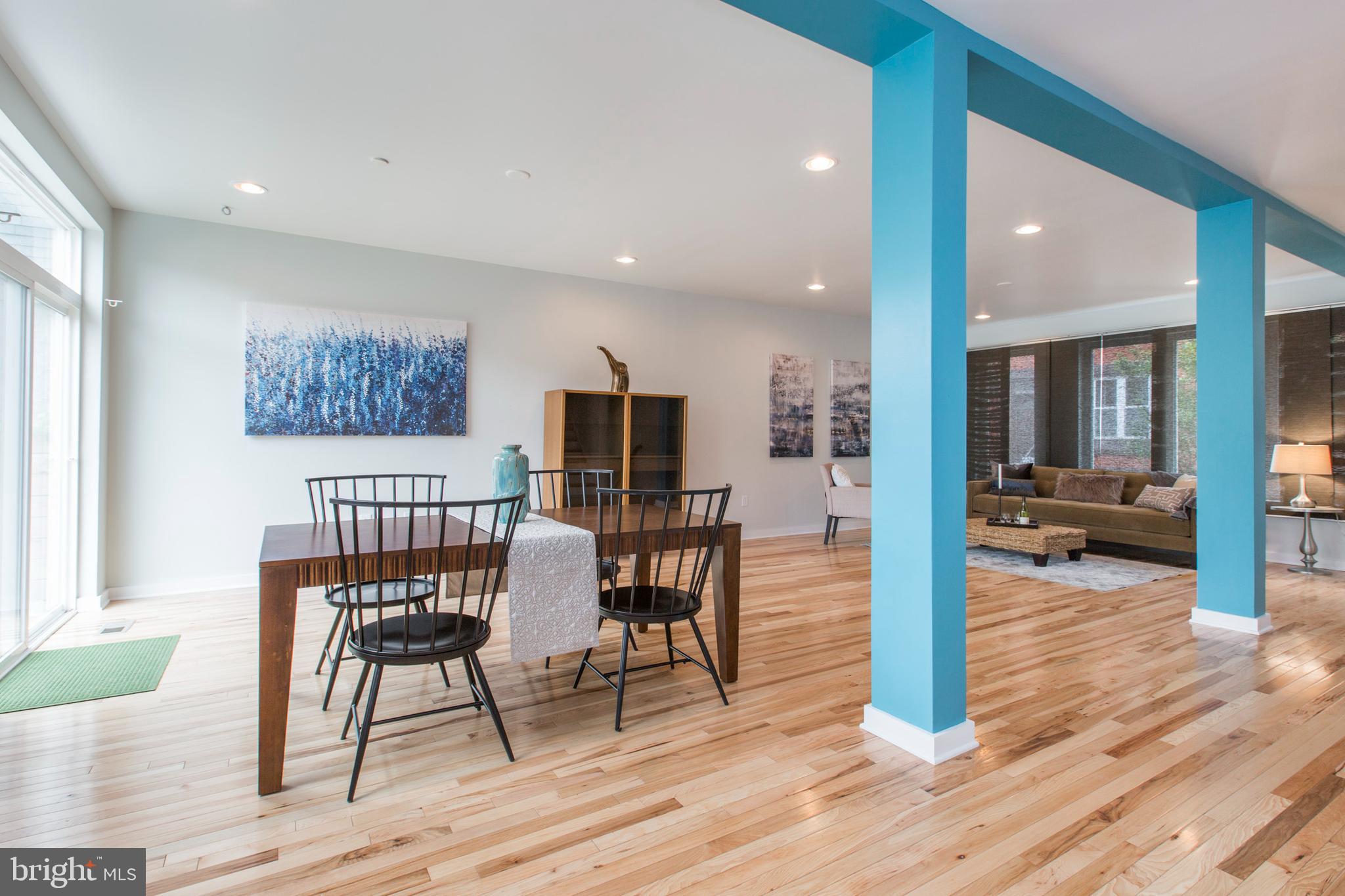 3039-41 Baltz Street Philadelphia, PA 19121 - Photo 15 of 35 a living room with furniture and a wooden floor