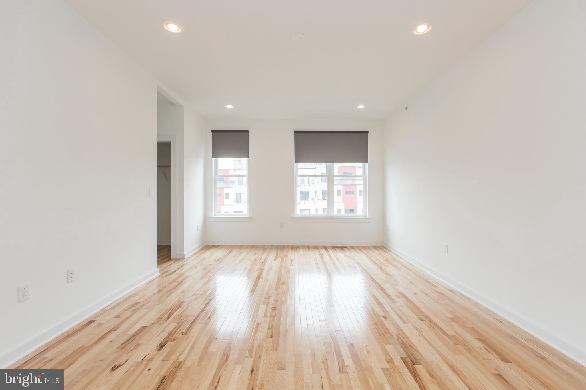 3039-41 Baltz Street Philadelphia, PA 19121 - Photo 21 of 35 a view of an empty room and window