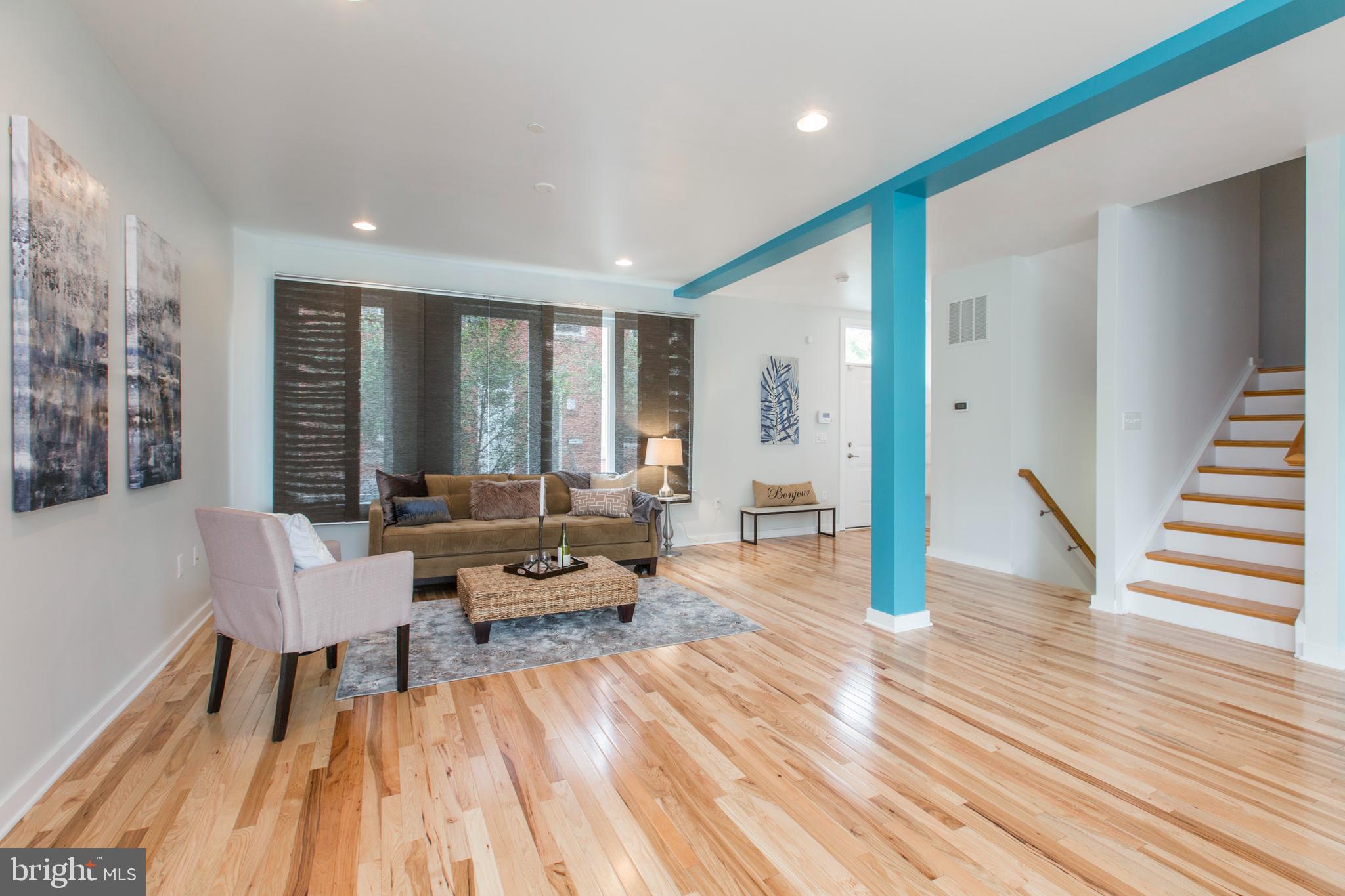 3039-41 Baltz Street Philadelphia, PA 19121 - Photo 6 of 35 a living room with furniture and wooden floor