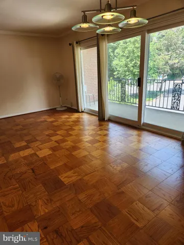 a view of a balcony with chair