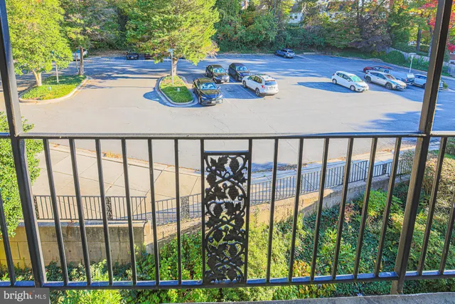 a utility room with multiple dryer and washer