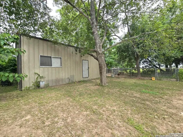 a house with trees in front of it