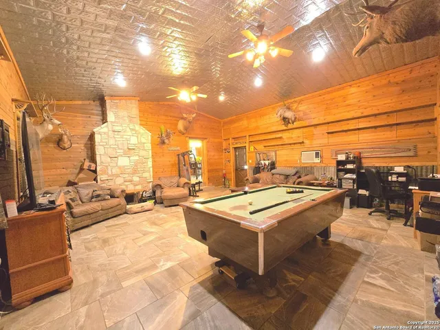 a view of a terrace with furniture and stove