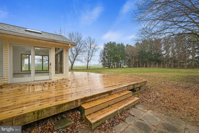 a view of swimming pool with a yard
