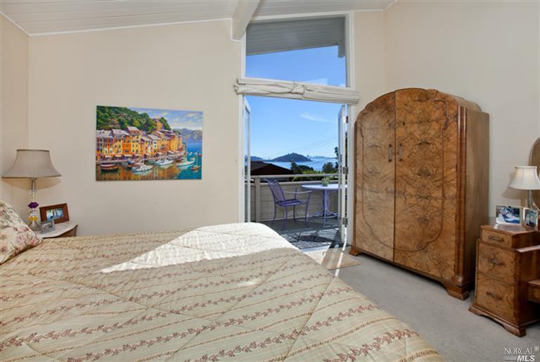 35 Reed Ranch Road Tiburon, CA 94920 - Photo 1 of 1 a bedroom with a bed and a dresser