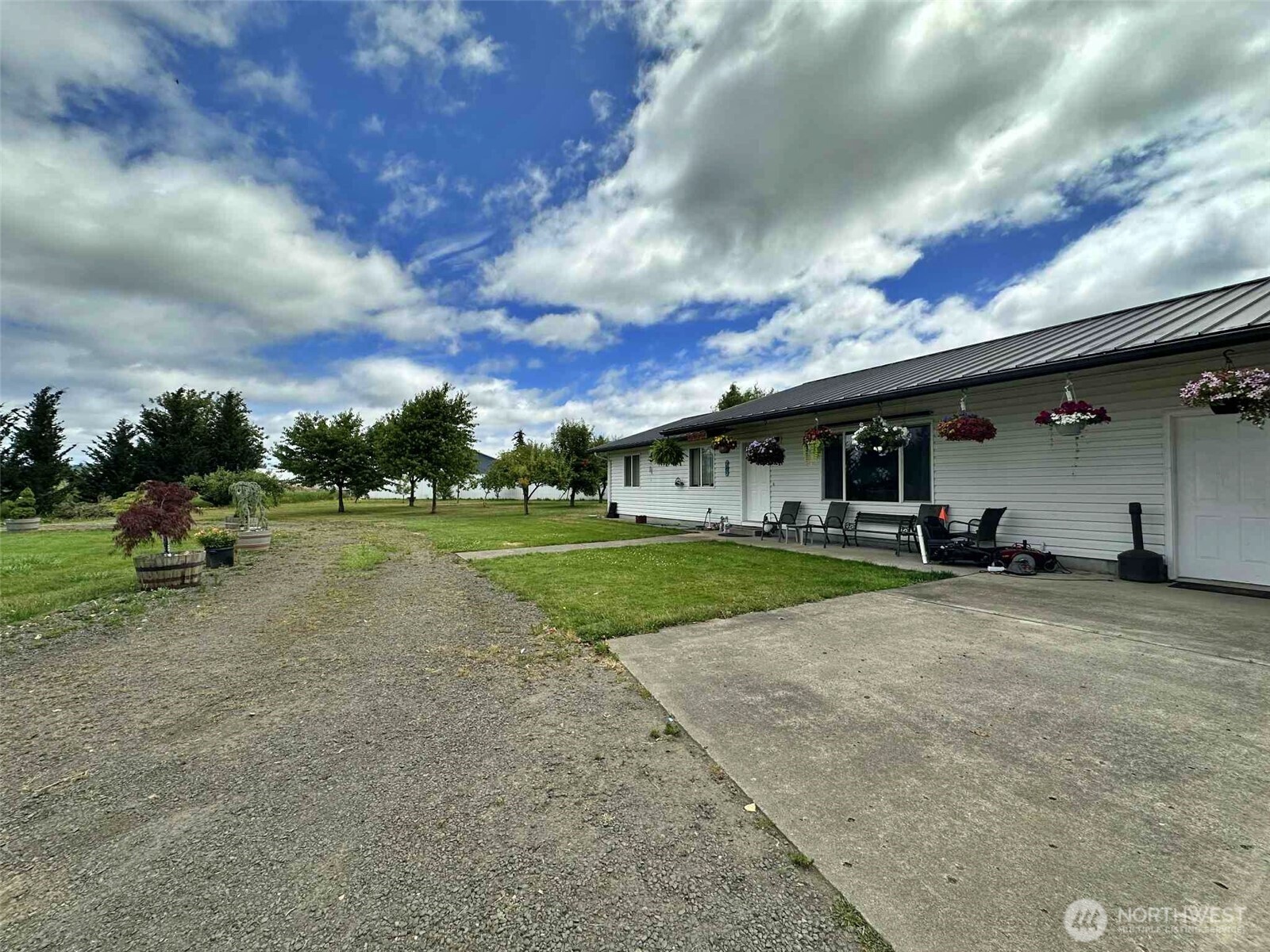 a view of a house with a big yard