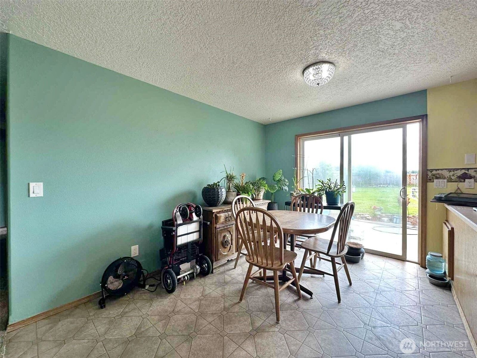 119 Brim Road Onalaska, WA 98570 - Photo 13 of 14 a dining room with furniture and a floor to ceiling window