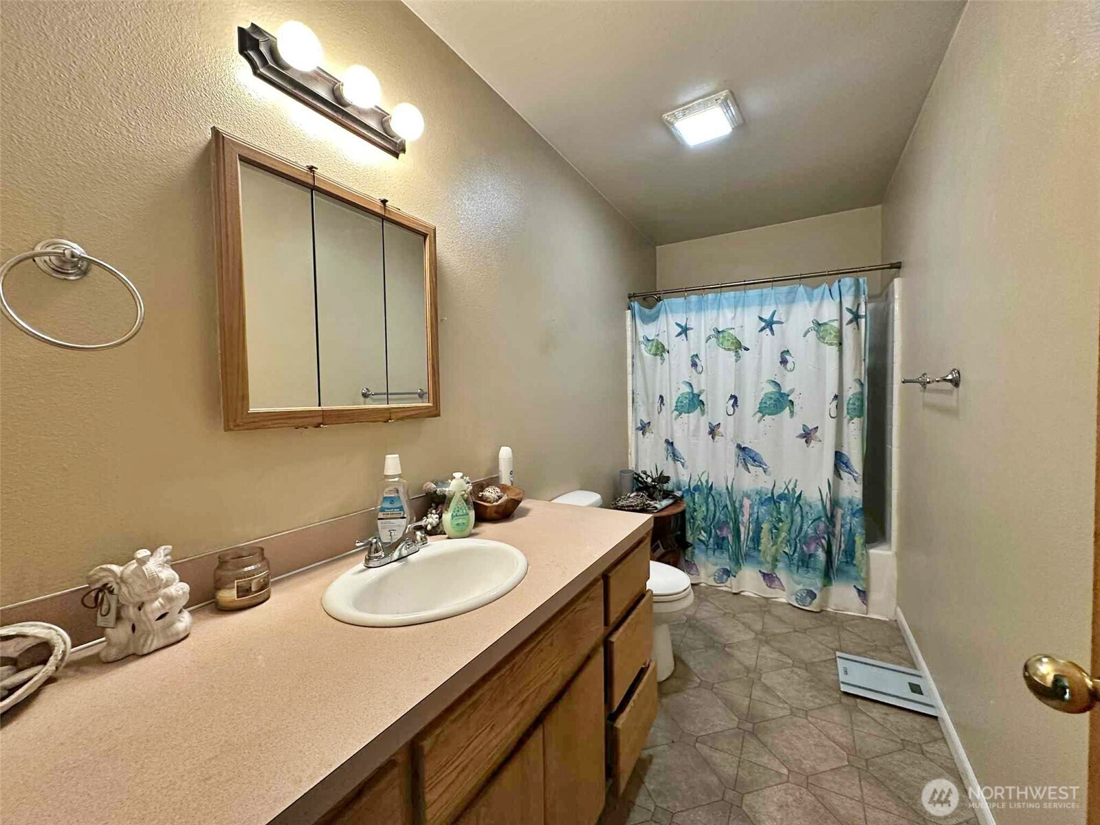 119 Brim Road Onalaska, WA 98570 - Photo 14 of 14 a bathroom with a sink a toilet and shower