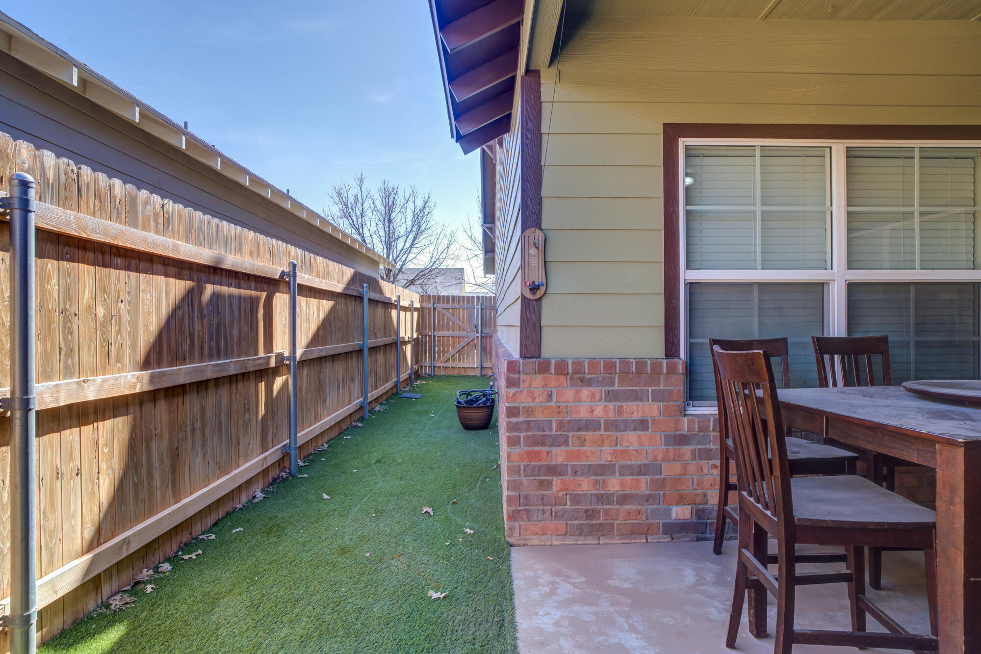 2118 9th Street Lubbock, TX 79401 - Photo 25 of 28 a view of outdoor seating area of the house