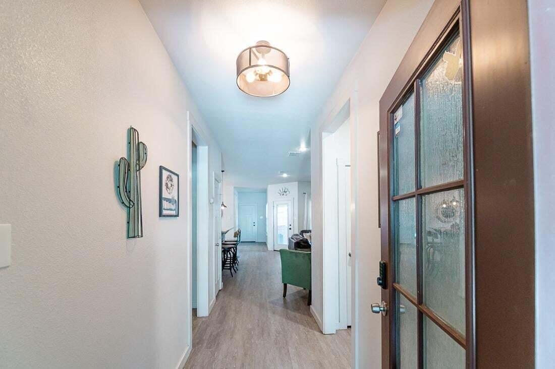 2118 9th Street Lubbock, TX 79401 - Photo 5 of 28 a view of a hallway with elevator