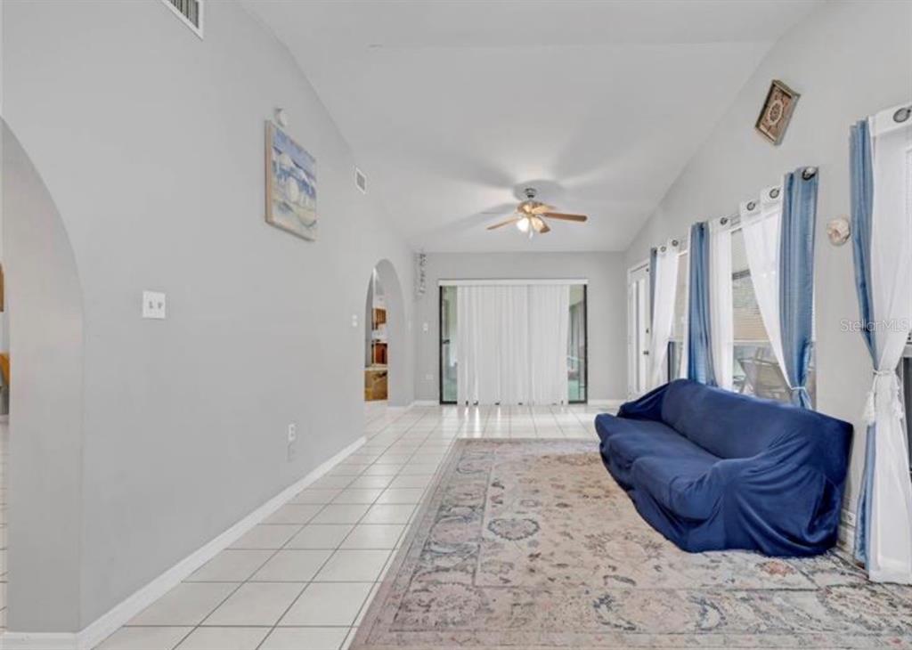 4308 Allen Road Fruitland Park, FL 34731 - Photo 11 of 33 a living room with furniture and a rug