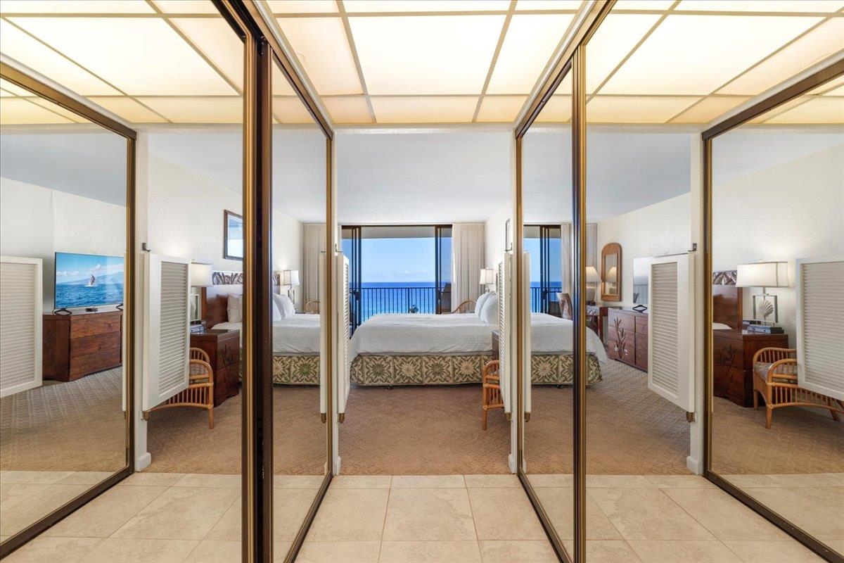 3445 Lower Honoapiilani Road, Unit 701 Lahaina, HI 96761 - Photo 27 of 40 a en suite bathroom with a tub and glass door