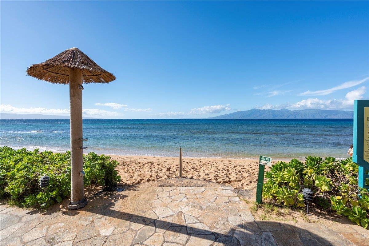 3445 Lower Honoapiilani Road, Unit 701 Lahaina, HI 96761 - Photo 37 of 40 a view of a street with a yard
