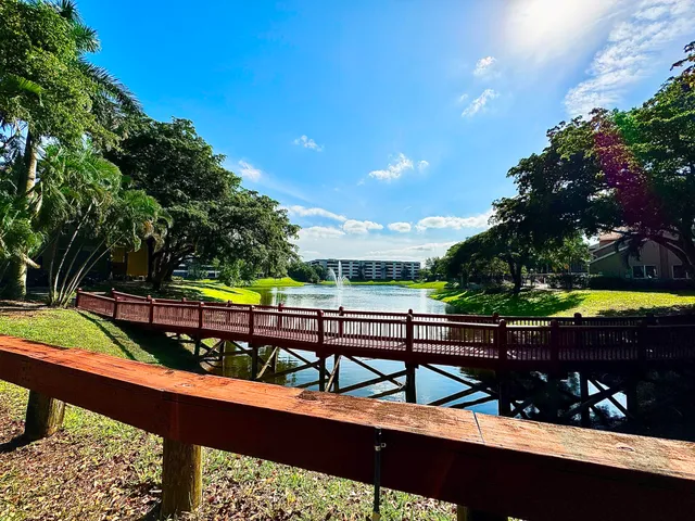 a view of a deck with a lake view
