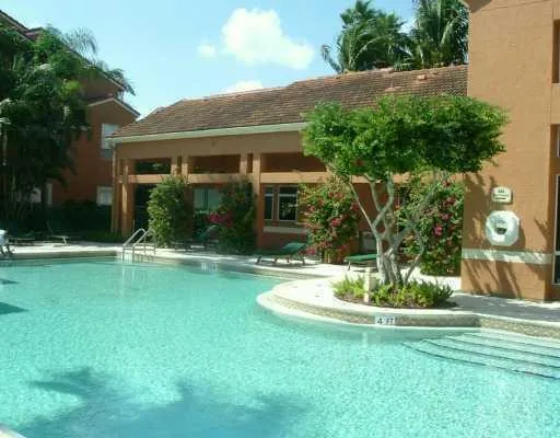 a view of swimming pool with lounge chair