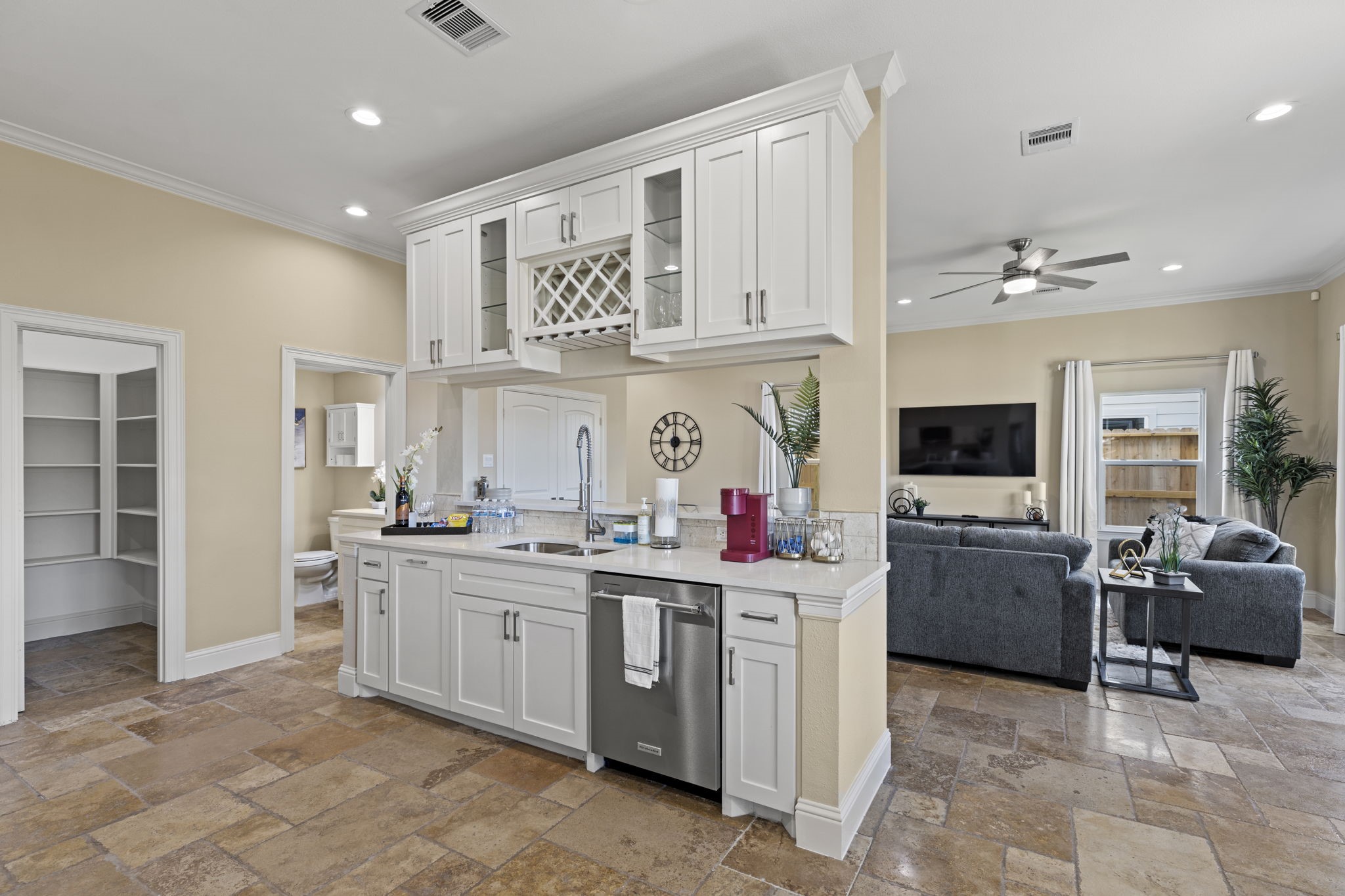 2211 Silverbonnet Street Houston, TX 77055 - Photo 16 of 39 a kitchen with cabinets and window