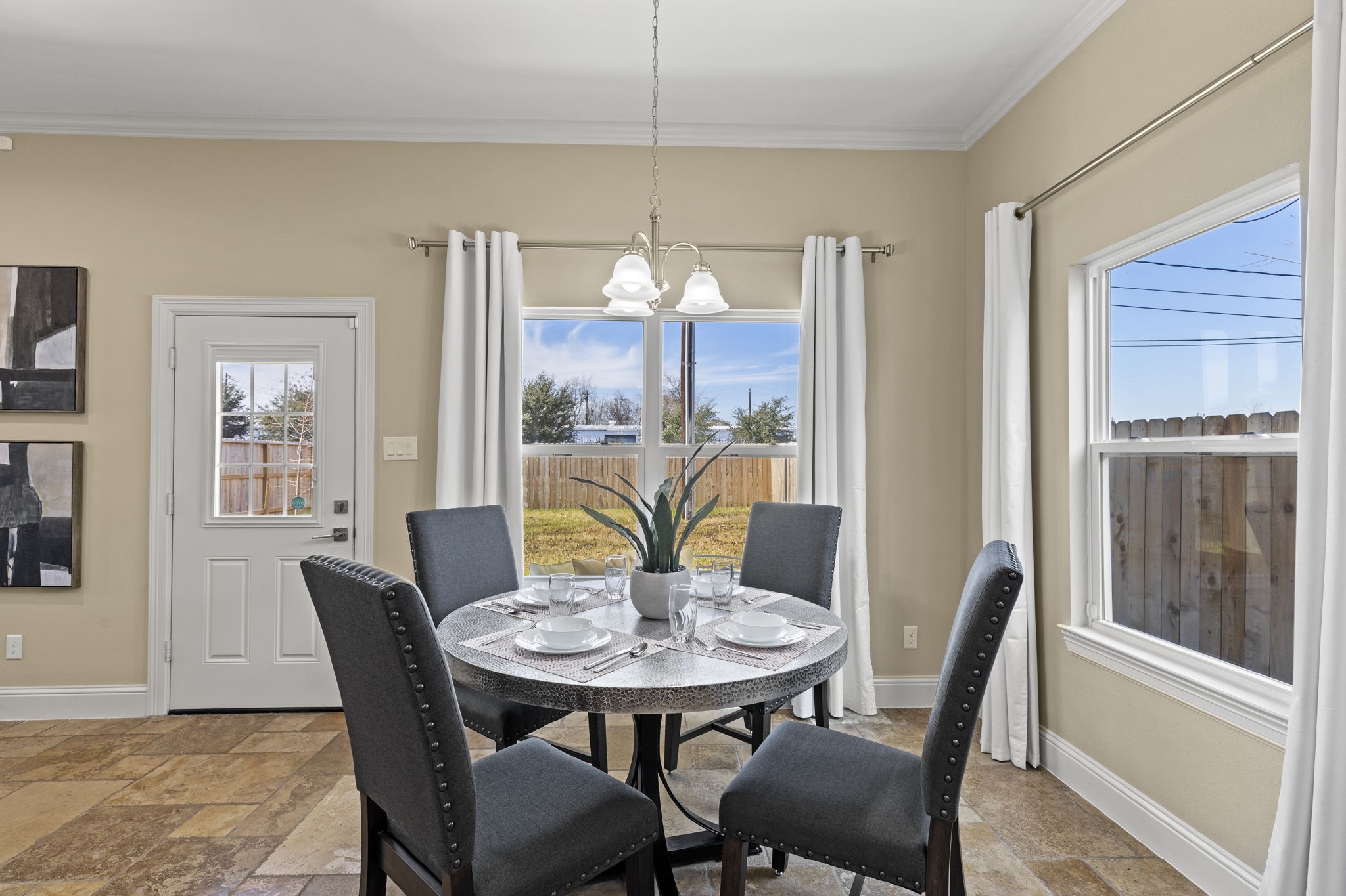 2211 Silverbonnet Street Houston, TX 77055 - Photo 18 of 39 a view of a dining room with furniture window and wooden floor