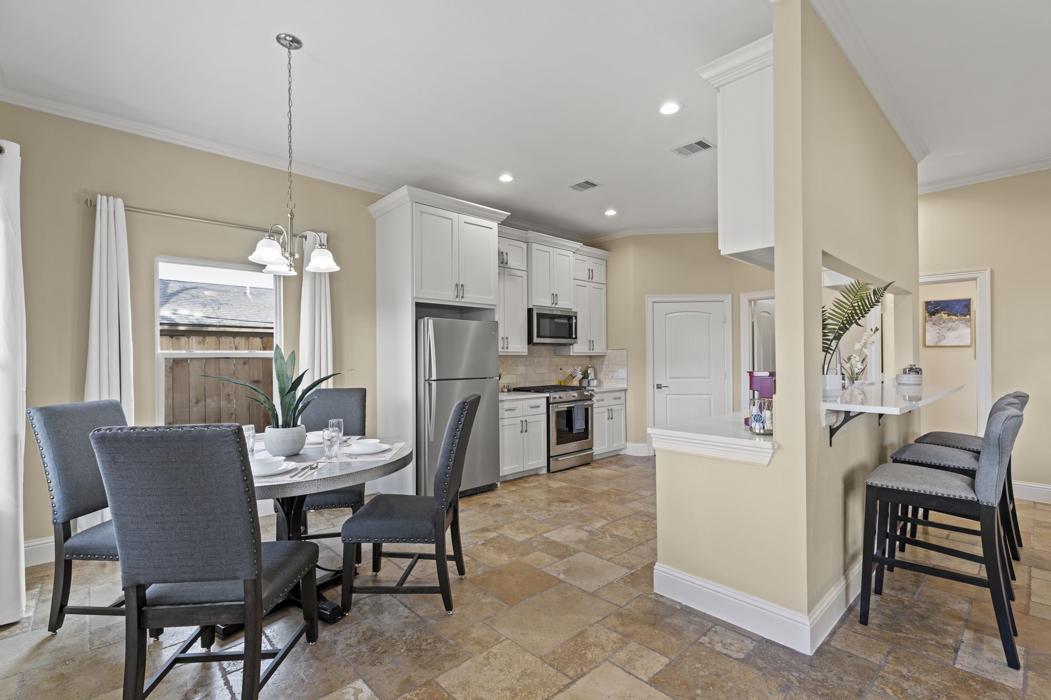 2211 Silverbonnet Street Houston, TX 77055 - Photo 19 of 39 a view of a dining room with furniture