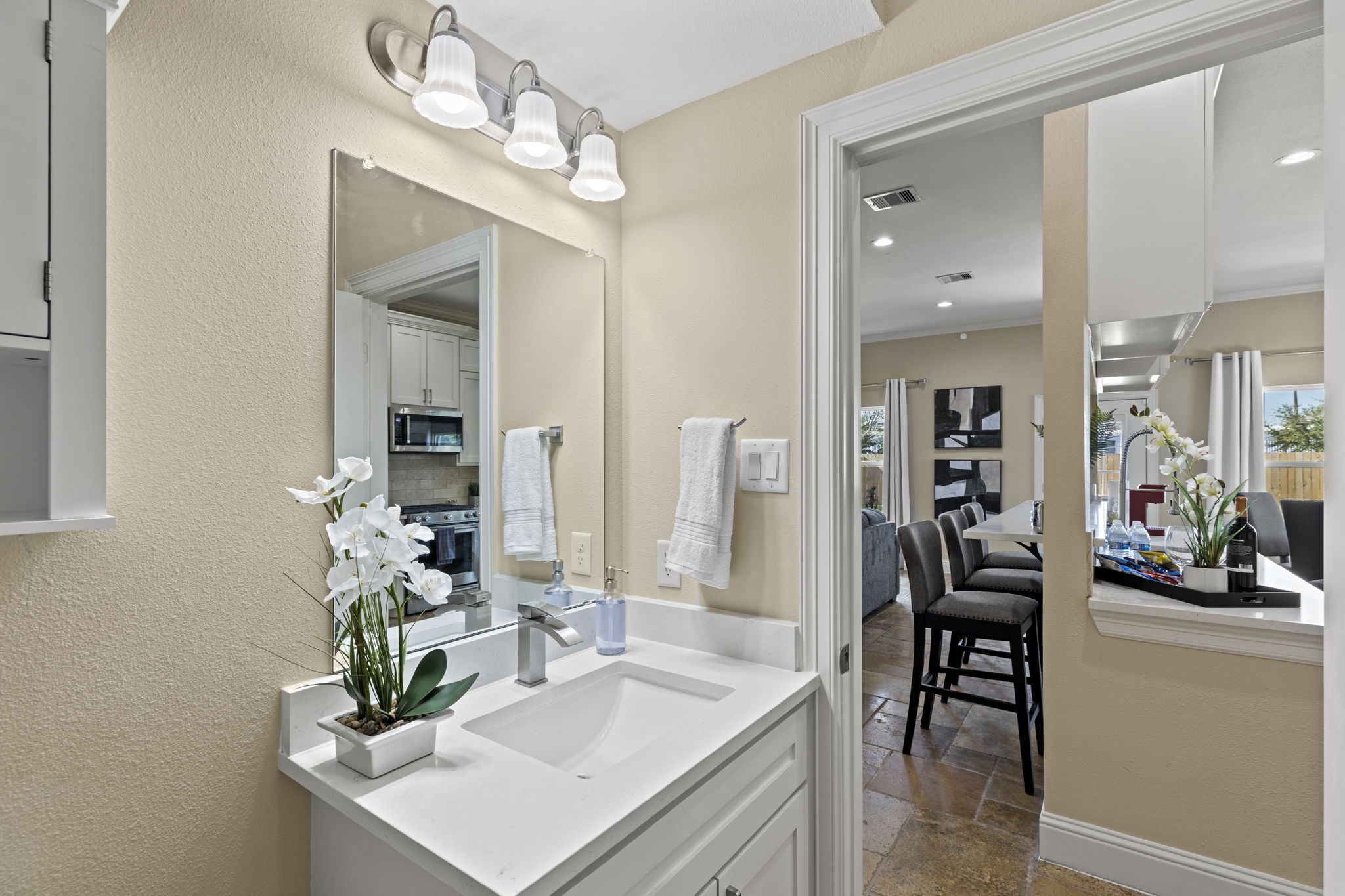 2211 Silverbonnet Street Houston, TX 77055 - Photo 22 of 39 a view of a dining room with furniture and a chandelier