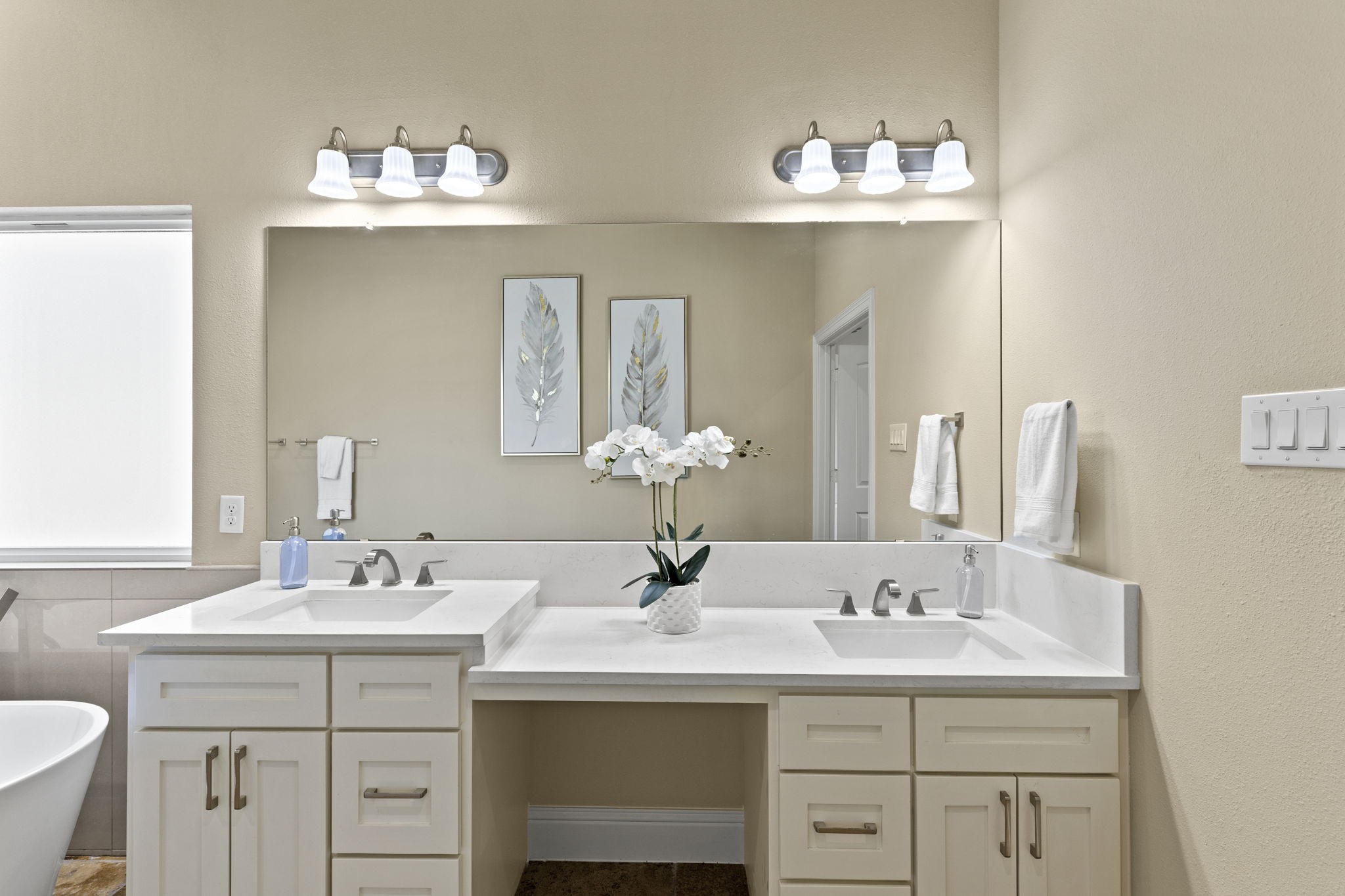 2211 Silverbonnet Street Houston, TX 77055 - Photo 30 of 39 a bathroom with a sink and a mirror