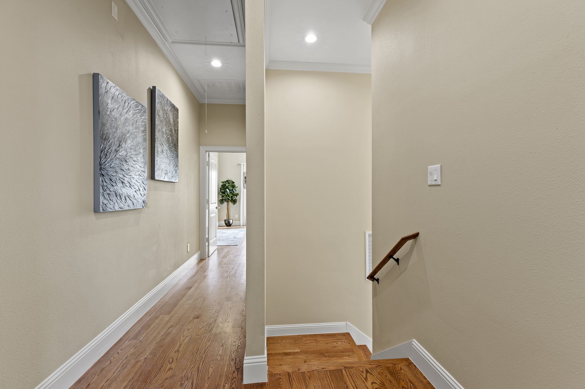 2211 Silverbonnet Street Houston, TX 77055 - Photo 32 of 39 a view of a hallway with wooden floor