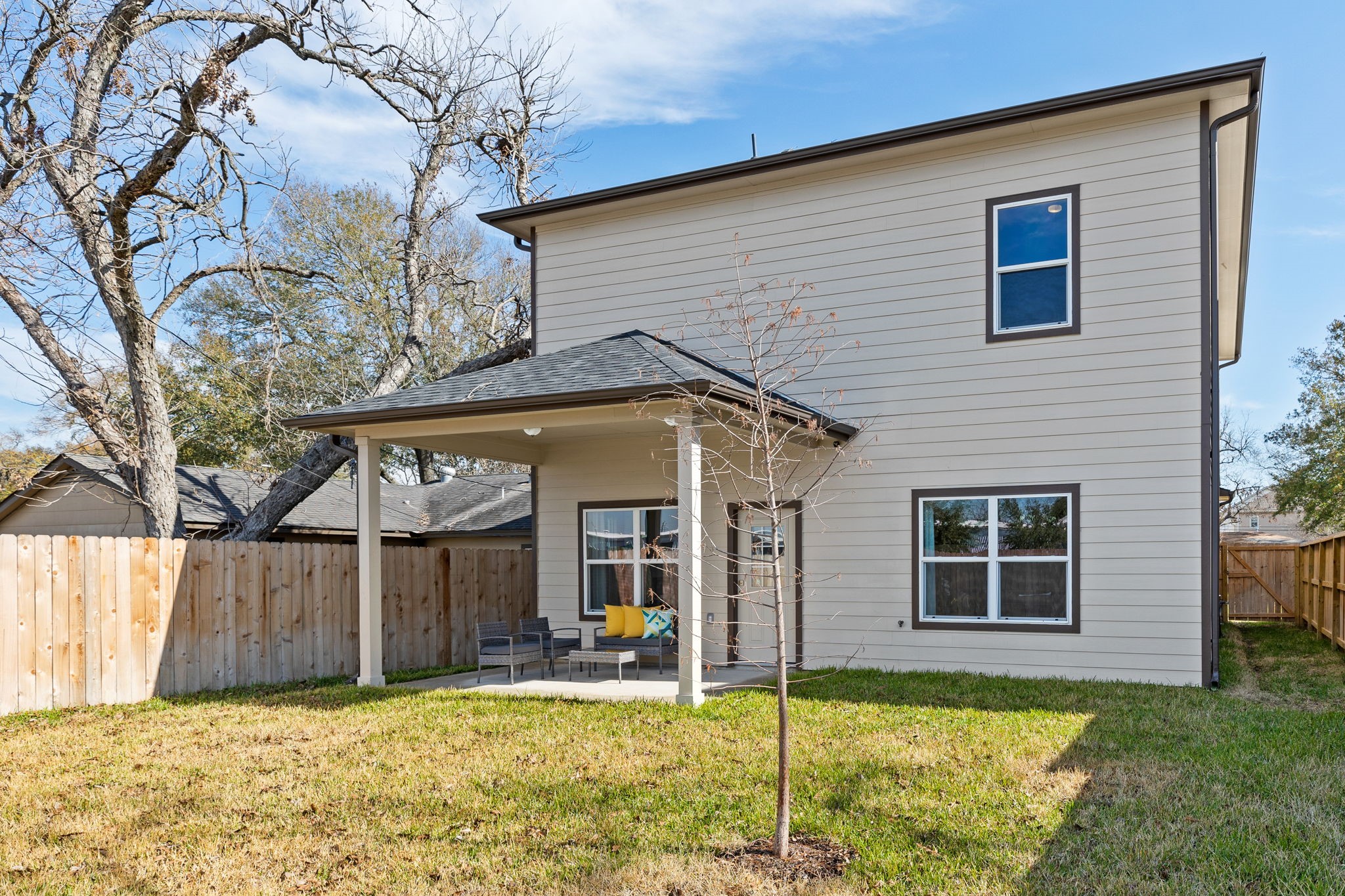 2211 Silverbonnet Street Houston, TX 77055 - Photo 5 of 39 a view of a house with backyard porch and sitting area