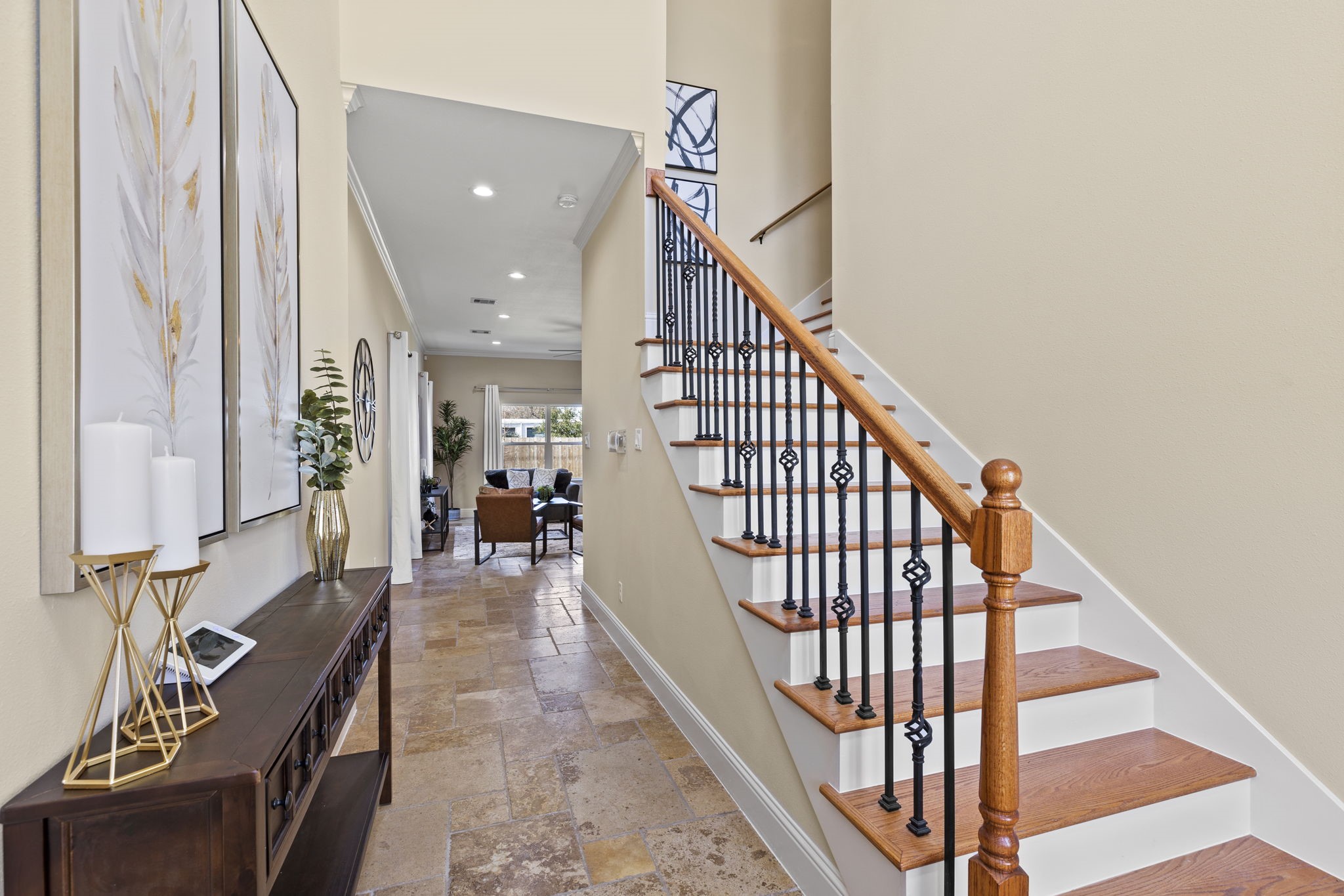 2211 Silverbonnet Street Houston, TX 77055 - Photo 6 of 39 a view of a hallway with wooden floor and stairs