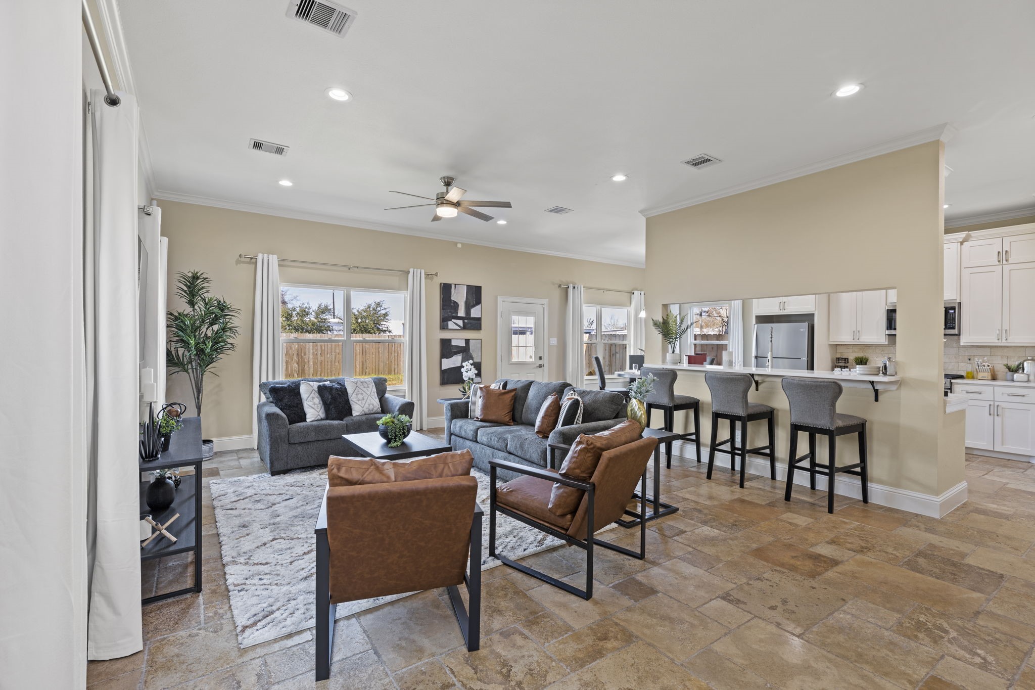 2211 Silverbonnet Street Houston, TX 77055 - Photo 8 of 39 a living room with furniture and a large window