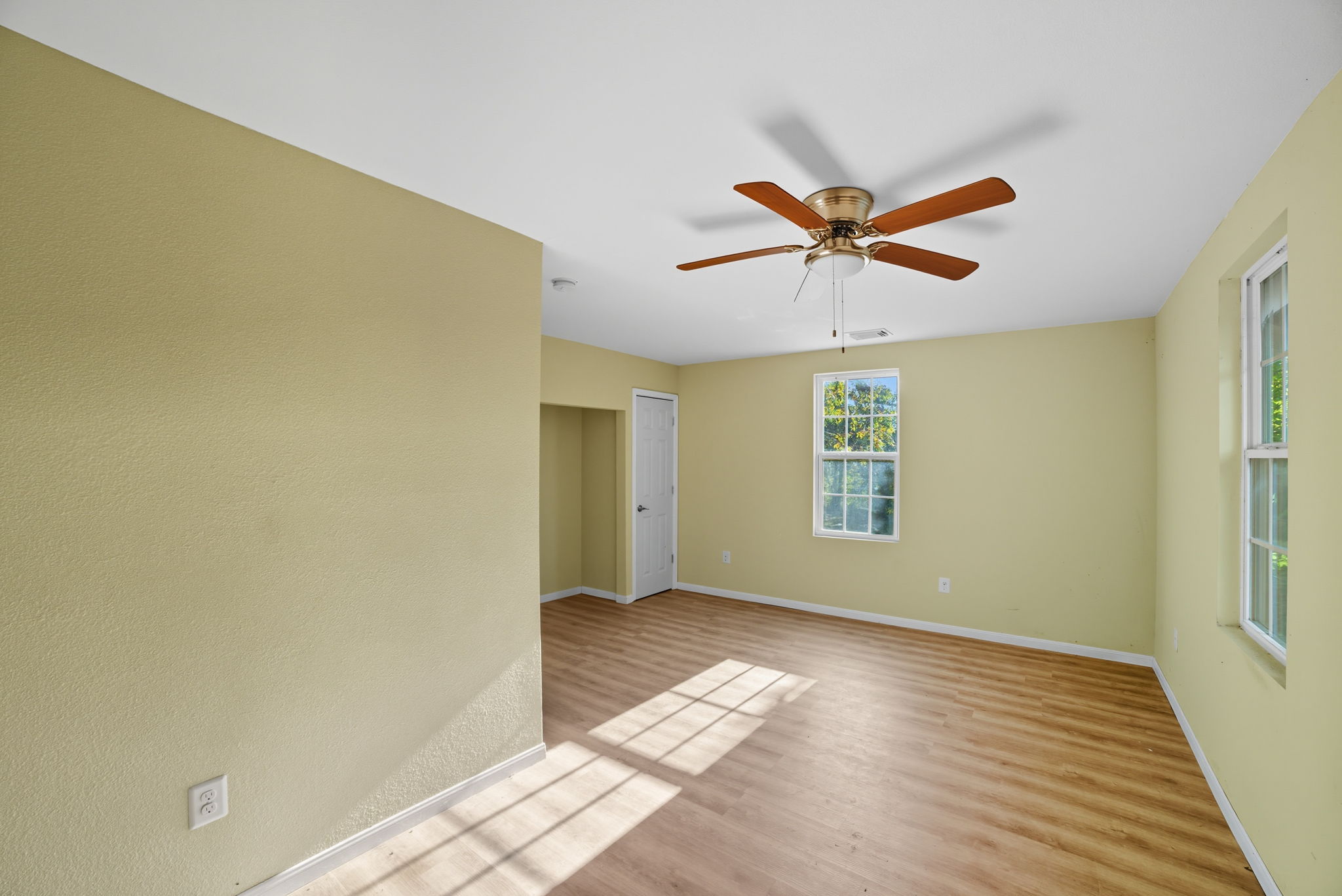 1413 South 2nd Street Temple, TX 76504 - Photo 19 of 24 a view of a livingroom with a window and a ceiling fan