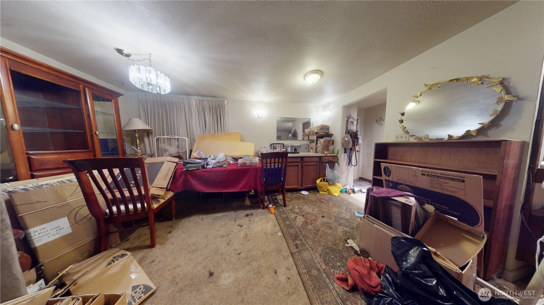 16835 113th Avenue Southeast Renton, WA 98055 - Photo 16 of 34 a living room with furniture a fireplace and a window