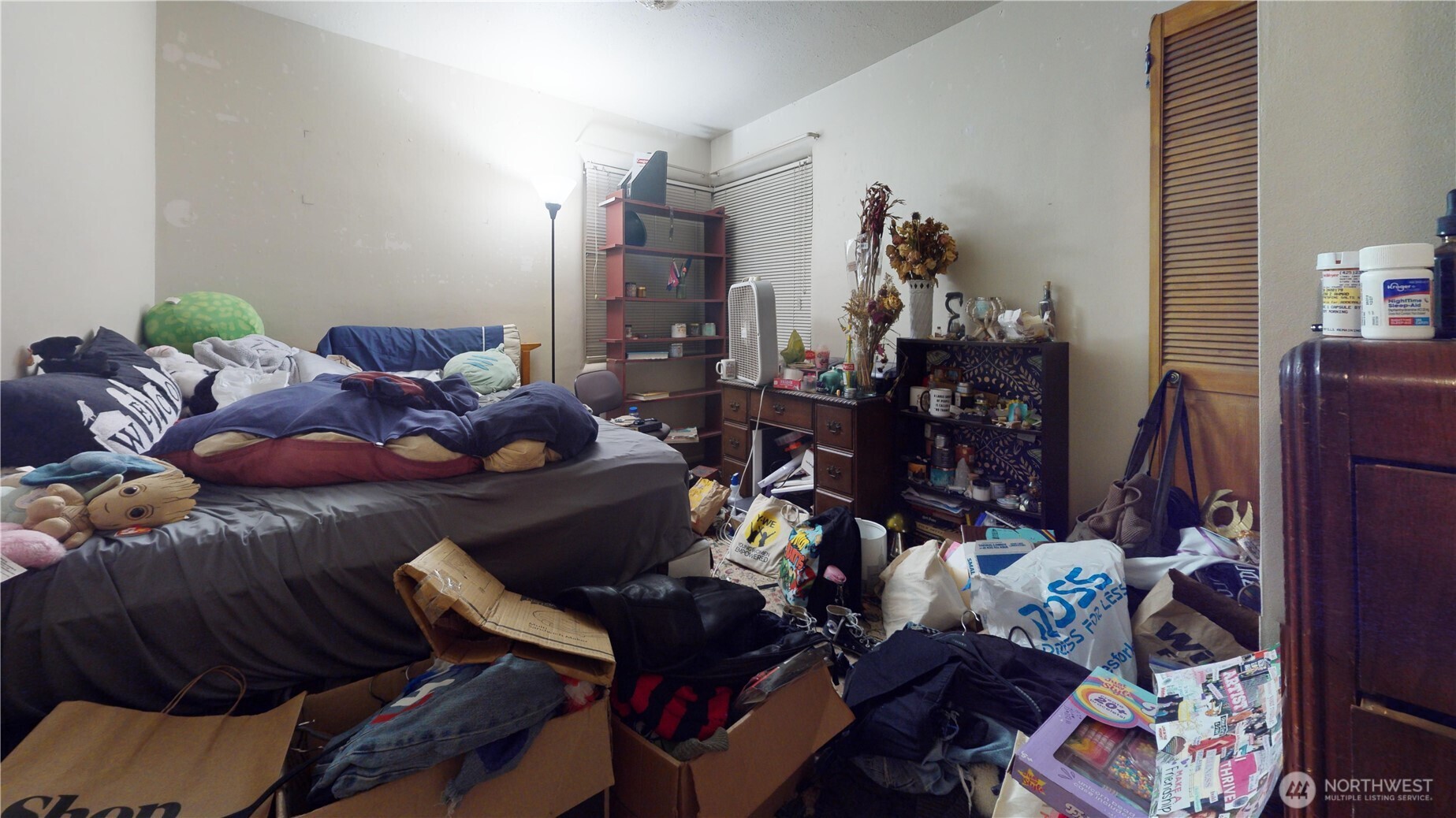 16835 113th Avenue Southeast Renton, WA 98055 - Photo 27 of 34 a room with lots of different colored cloths