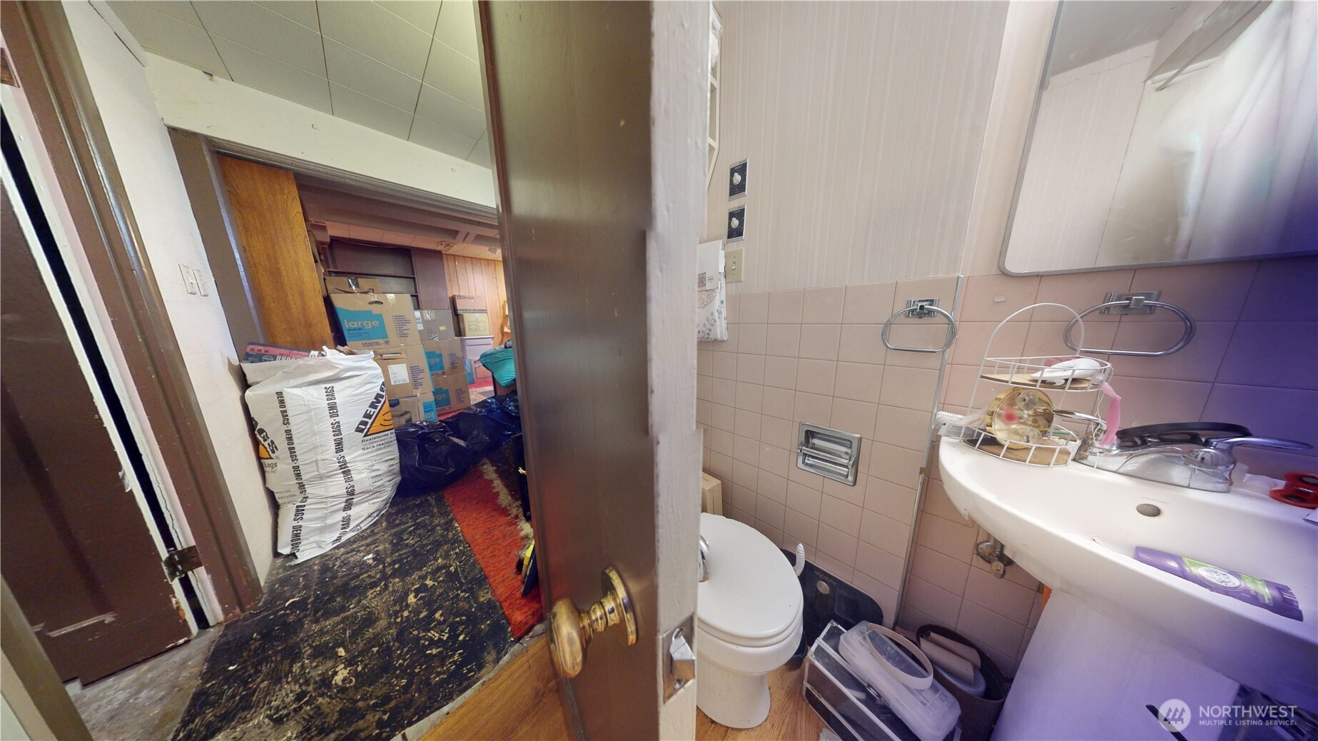 16835 113th Avenue Southeast Renton, WA 98055 - Photo 5 of 34 a bathroom with a sink toilet vanity and shower