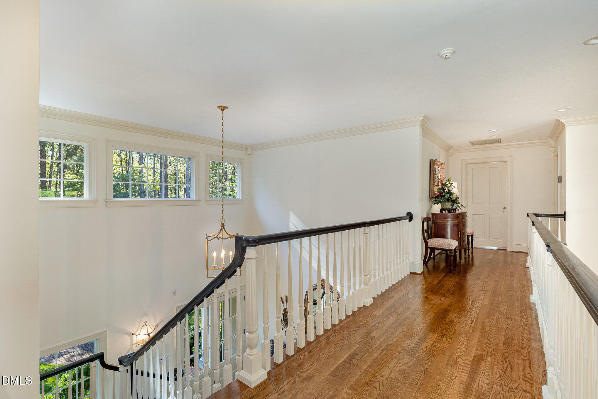 672 Lake Wackena Road Goldsboro, NC 27534 - Photo 11 of 46 a view of hallway with wooden floor and stairs