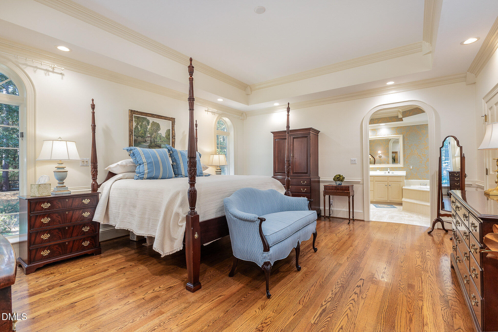 672 Lake Wackena Road Goldsboro, NC 27534 - Photo 13 of 46 a bed room with furniture and a wooden floor