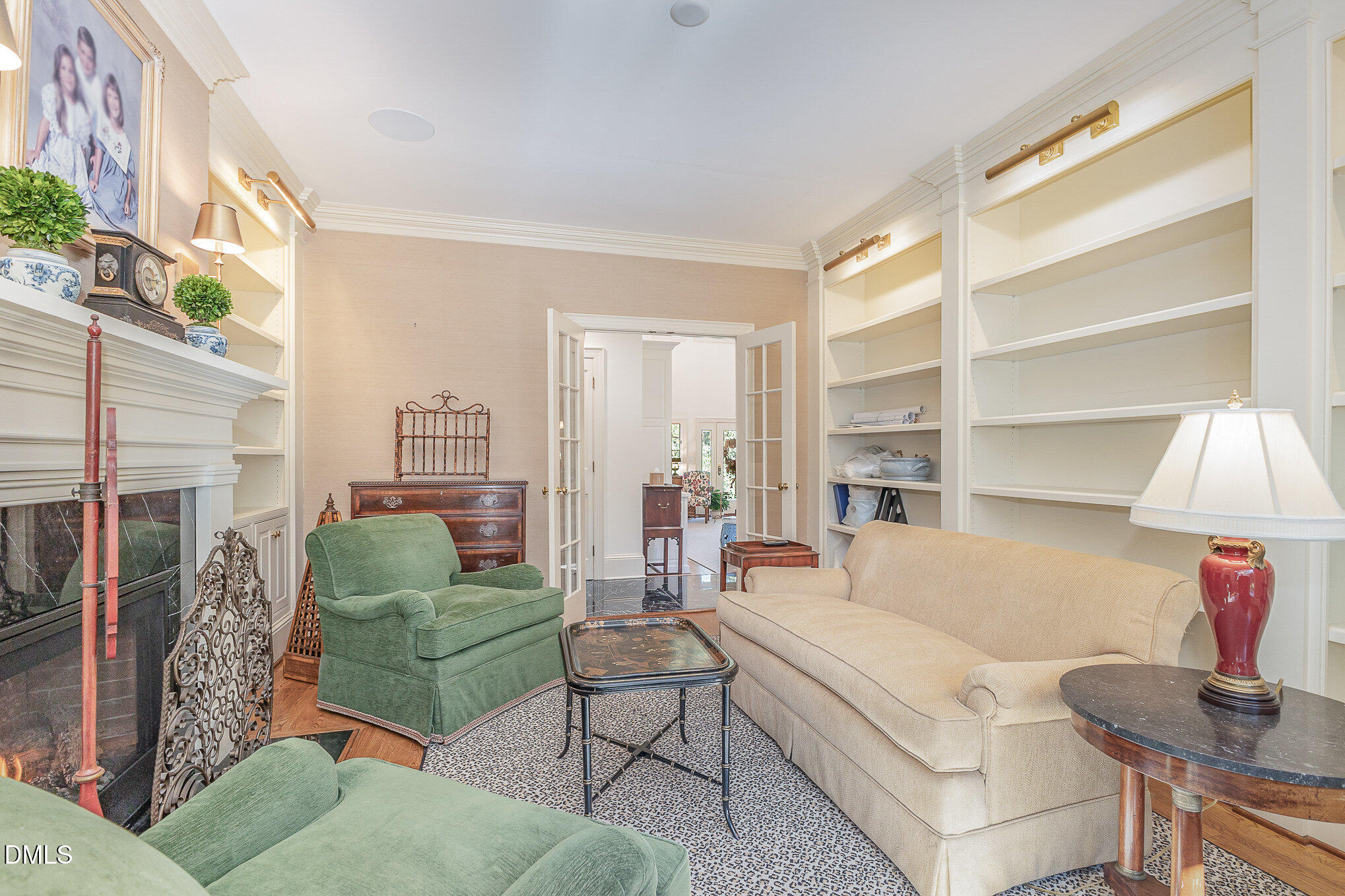 672 Lake Wackena Road Goldsboro, NC 27534 - Photo 19 of 46 a living room with furniture and a fireplace