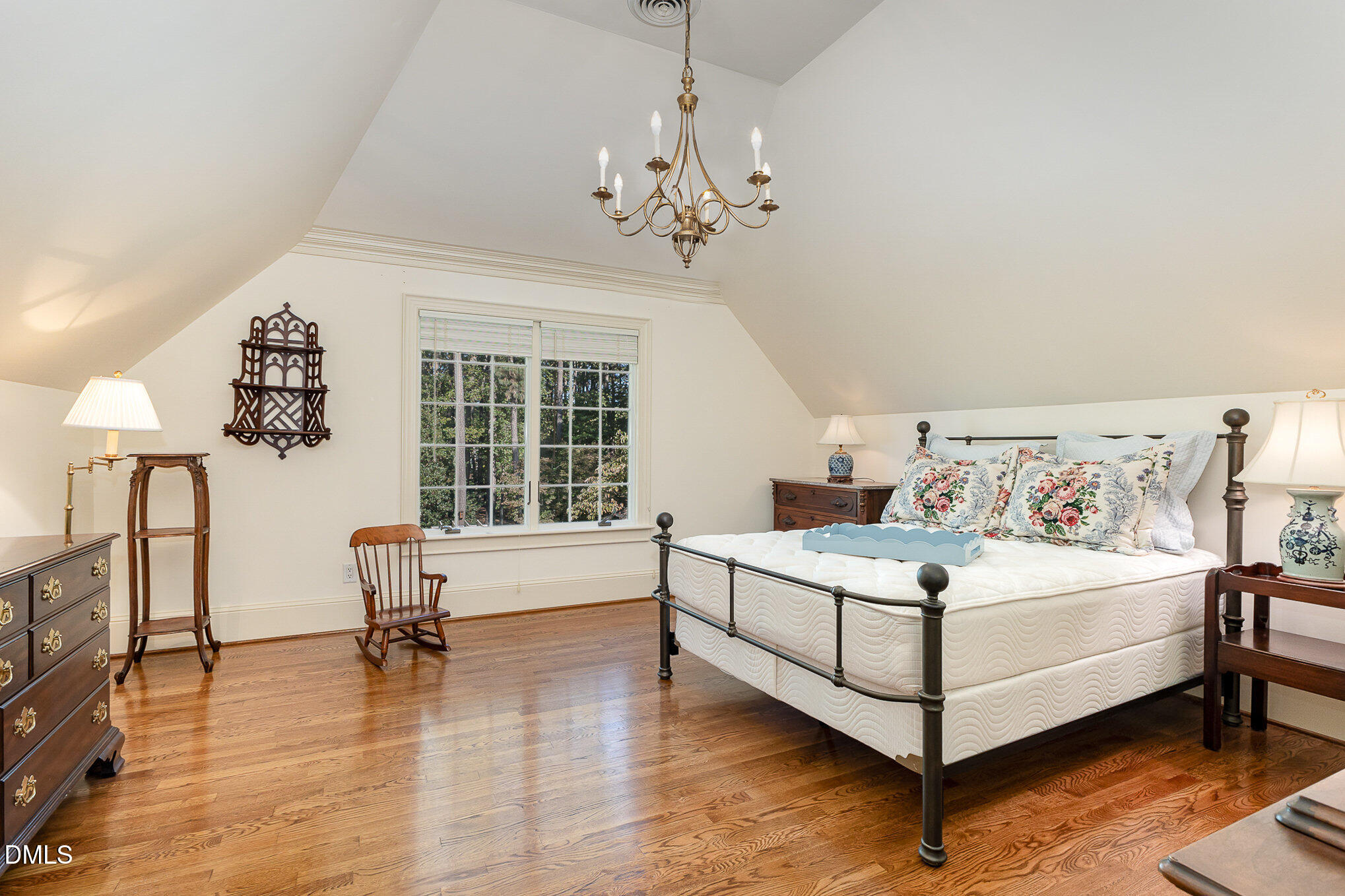 672 Lake Wackena Road Goldsboro, NC 27534 - Photo 23 of 46 a living room with furniture and a chandelier
