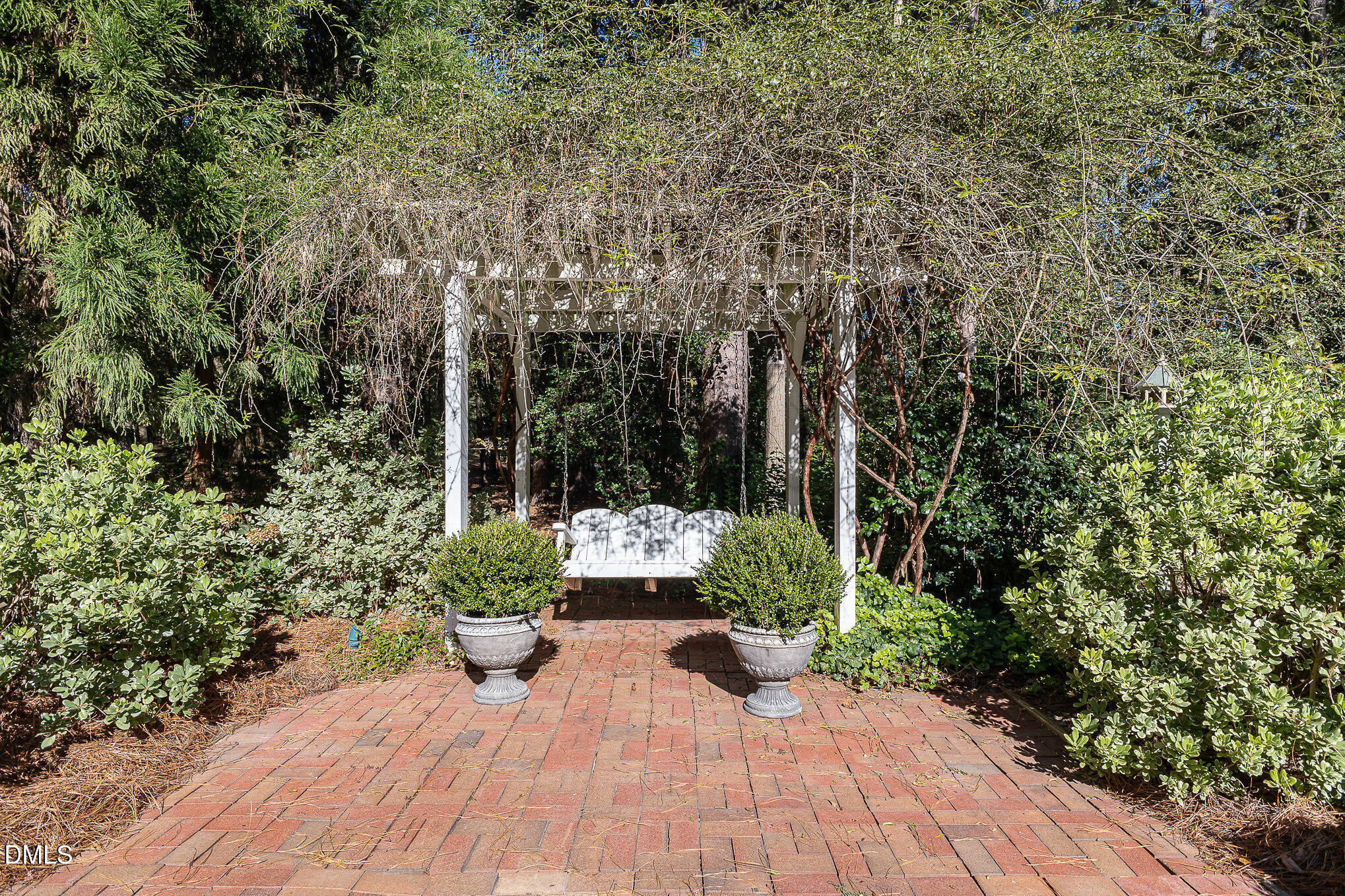 672 Lake Wackena Road Goldsboro, NC 27534 - Photo 42 of 46 a view of a backyard with sitting area