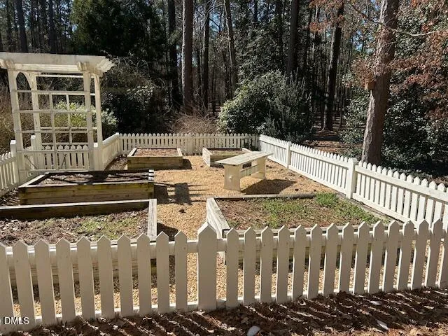 a view of a wooden deck with chairs