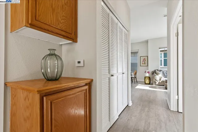 a view of hallway with livingroom