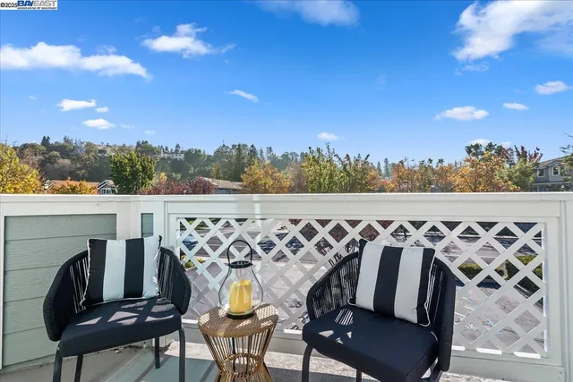 a view of a chairs and table on the terrace