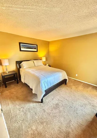 a room with gym equipment and a table