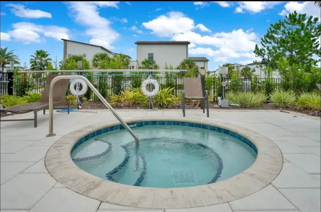 a view of a wooden floor with a swimming pool