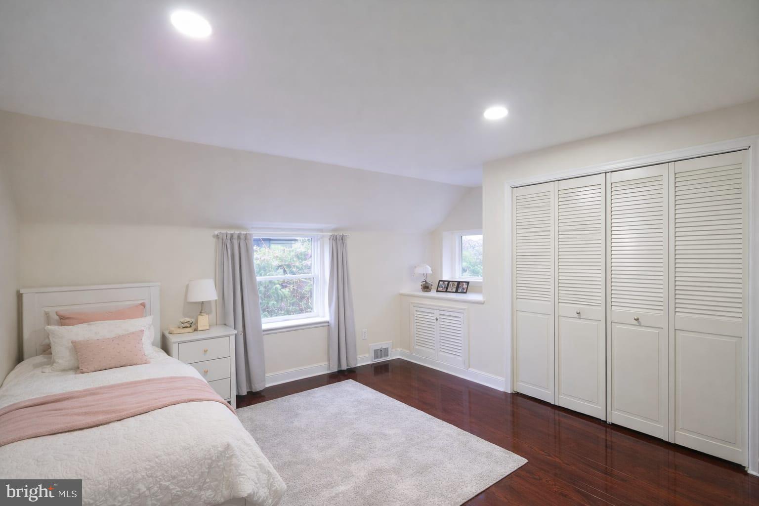 103 North 27th Street Reading, PA 19606 - Photo 9 of 15 a bedroom with a bed and a window