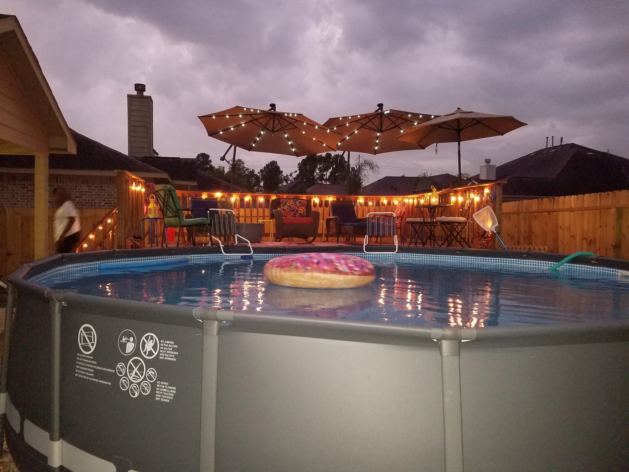 6719 Latchmore Lane Houston, TX 77049 - Photo 45 of 46 a view of a swimming pool with an outdoor seating