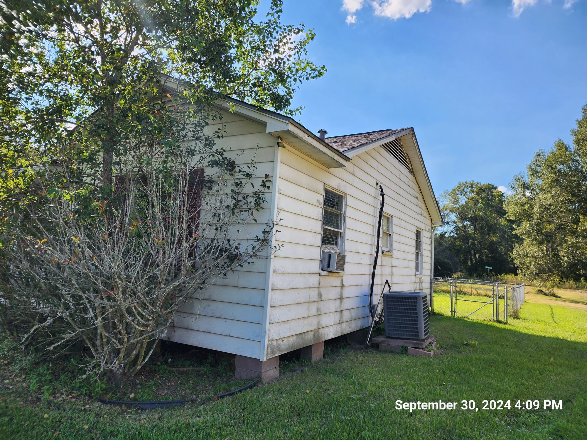 11645 Loop Road Beaumont, TX 77713 - Photo 20 of 20 a view of a house with a yard