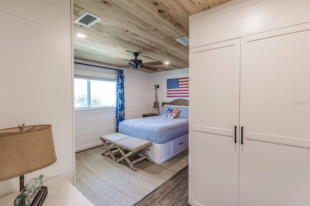 6020 Midnight Pass Road, Unit 26 Sarasota, FL 34242 - Photo 17 of 25 a room with furniture