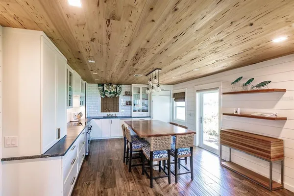 a very nice looking kitchen with a large window