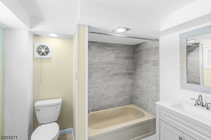 26 Schooleys Mountain Road Long Valley, NJ 07853 - Photo 7 of 10 a bathroom with a toilet sink and shower