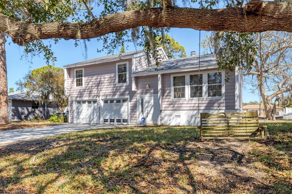 1172 Kenisco Road Venice, FL 34293 - Photo 1 of 1 a view of a house with a yard