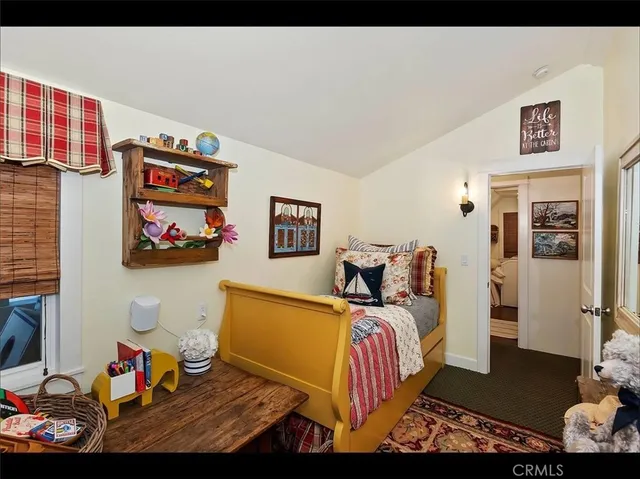 a bedroom with furniture and a bed